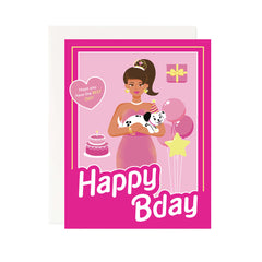 A Pink Barbie themed birthday card. Features and illustration of a barbie with a pony tail holding a little Dalmatian puppy with a birthday hat on, balloons, cake and a gift in the background. Card reads Happy Bday and inside a little heart says hope you have the best day!