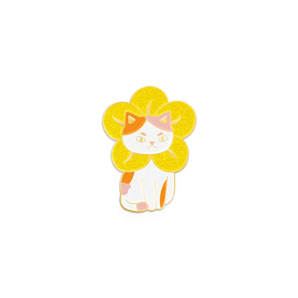 White cat with yellow glitter flower around the neck with orange and pink spots on a white background.