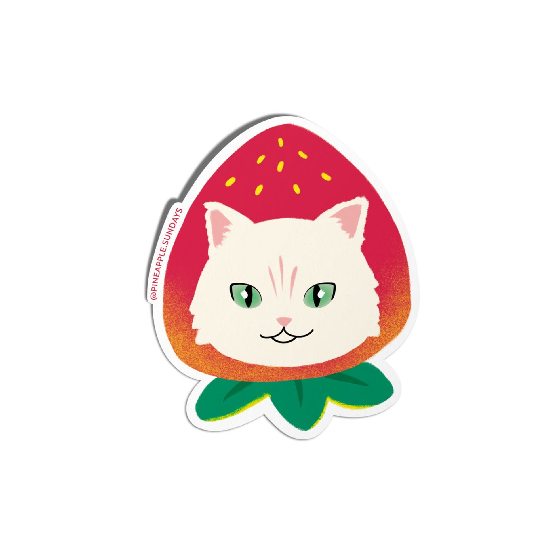 Sticker of a cat face inside a strawberry on a white background. Pineapple Sundays Design Studio. Black owned company and stationery store.