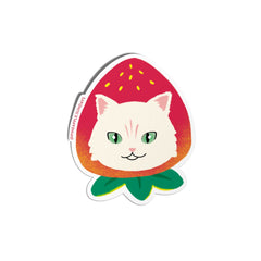 Sticker of a cat face inside a strawberry on a white background. Pineapple Sundays Design Studio. Black owned company and stationery store.